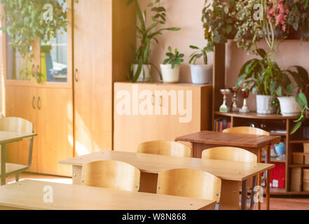 Back to school. School class in a rural school. Old furniture. Toned image. Stock Photo