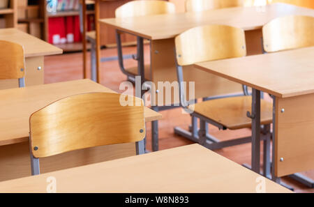 Empty school class. School desks and chairs,back to school. Beginning of the school year. Stock Photo
