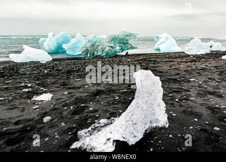 pieces of ice on the Diamond Beach at jokulsarlon in Iceland Stock Photo