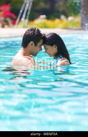 Smiling Woman Relaxing With Boyfriend In Swimming Free Stock Photo and  Image 483862168