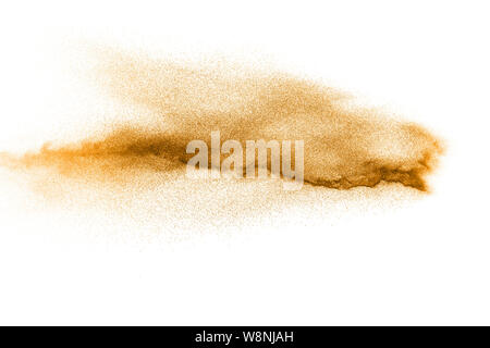 Explosion Of Orange Powder On White Background Stock Photo