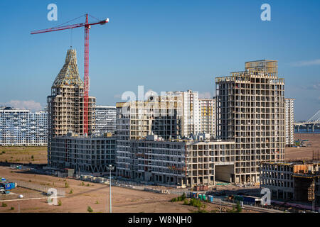 Modern apartment block under construction in St Petersburg, Russia on 22 July 2019 Stock Photo