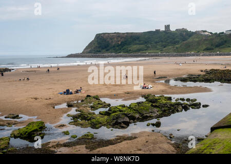 03/08/2019, Scarborough, North Yorkshire, Uk People at Scarborough beach enjoying a day at thbe seaside on a hot August summers day Stock Photo