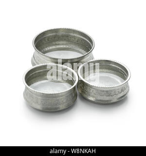 Decorated silver colored metal Hammam water bowls with water isolated on white background Stock Photo