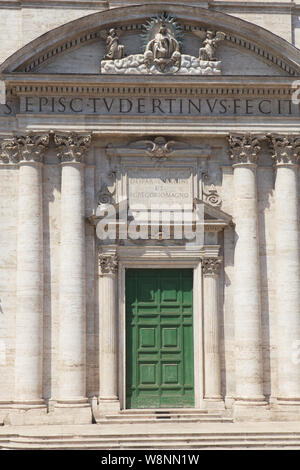 The priest of St. Paul and St. Peter's Church greets neighbours after ...