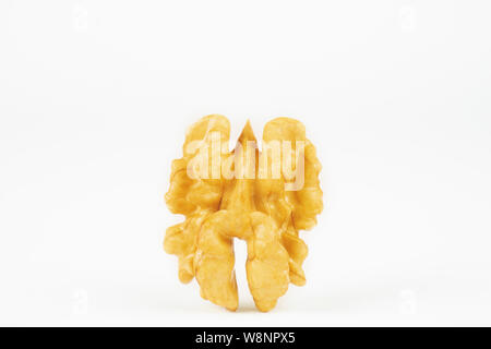 Walnut isolated on white background. Pile of walnut without shell closeup for your design and print. Nuts collection Stock Photo