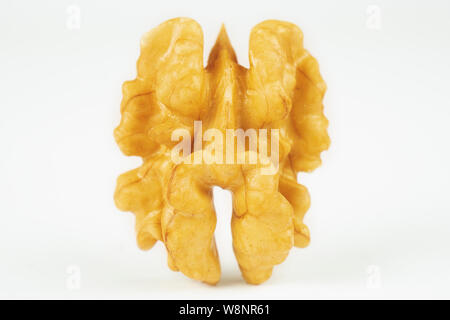 Walnut isolated on white background. Pile of walnut without shell closeup for your design and print. Nuts collection Stock Photo