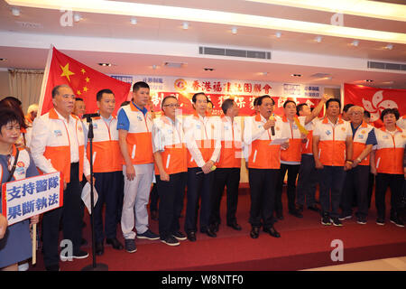 Hong Kong, China. 10th Aug, 2019. Representatives of the Hong Kong Federation of Fujian Associations express their support for the police force during a meeting in Hong Kong, south China, Aug. 10, 2019. Credit: Wu Xiaochu/Xinhua/Alamy Live News Stock Photo