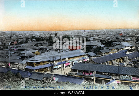 [ 1910s Japan - Panoramic View of Tokyo ] —   A spectacular view on the city of Tokyo from Atago-yama, a hill some 26 meters above sea-level. Shops and dwellings have taken the place of the great residences of the daimyo. In the far background, the roof of Tsukiji Honganji can be seen. Beyond that is Tokyo Bay.  20th century vintage postcard. Stock Photo