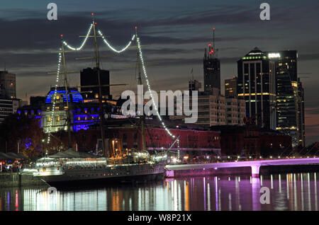 Puerto Madero, seen here at night, is a popular destination for both travelers and locals in the South American city of Buenos Aires, Argentina Stock Photo