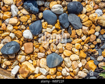 Closeup of small  stones with black rocks Stock Photo
