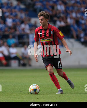 Magdeburg, Germany. 10th Aug, 2019. Soccer: DFB Cup, 1st FC Magdeburg - SC Freiburg, 1st round in the MDCC Arena. Freiburg's Luca Waldschmidt is on the ball. Credit: Peter Steffen/dpa - IMPORTANT NOTE: In accordance with the requirements of the DFL Deutsche Fußball Liga or the DFB Deutscher Fußball-Bund, it is prohibited to use or have used photographs taken in the stadium and/or the match in the form of sequence images and/or video-like photo sequences./dpa/Alamy Live News Stock Photo