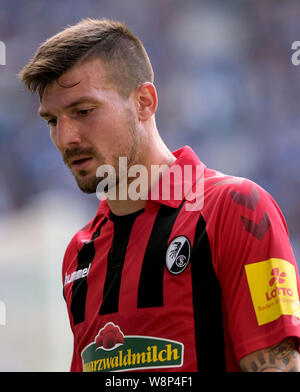 Magdeburg, Germany. 10th Aug, 2019. Soccer: DFB Cup, 1st FC Magdeburg - SC Freiburg, 1st round in the MDCC Arena. Freiburg's Jerome Gondorf is on the lawn. Credit: Peter Steffen/dpa - IMPORTANT NOTE: In accordance with the requirements of the DFL Deutsche Fußball Liga or the DFB Deutscher Fußball-Bund, it is prohibited to use or have used photographs taken in the stadium and/or the match in the form of sequence images and/or video-like photo sequences./dpa/Alamy Live News Stock Photo