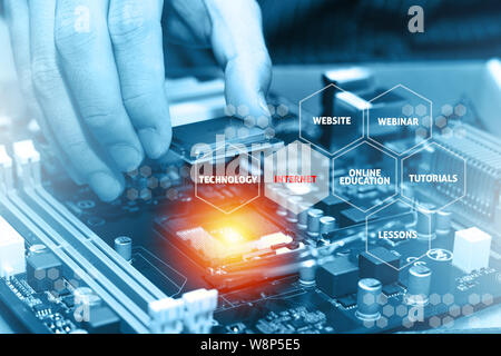 Assembling high performance personal computer. Online Education Concept Stock Photo