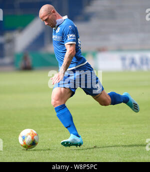 Magdeburg, Germany. 10th Aug, 2019. Soccer: DFB Cup, 1st FC Magdeburg - SC Freiburg, 1st round in the MDCC Arena. Magdeburg's Timo Perthel is on the ball. Credit: Peter Steffen/dpa - IMPORTANT NOTE: In accordance with the requirements of the DFL Deutsche Fußball Liga or the DFB Deutscher Fußball-Bund, it is prohibited to use or have used photographs taken in the stadium and/or the match in the form of sequence images and/or video-like photo sequences./dpa/Alamy Live News Stock Photo