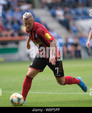 Magdeburg, Germany. 10th Aug, 2019. Soccer: DFB Cup, 1st FC Magdeburg - SC Freiburg, 1st round in the MDCC Arena. Freiburg's Jonathan Schmid is on the ball. Credit: Peter Steffen/dpa - IMPORTANT NOTE: In accordance with the requirements of the DFL Deutsche Fußball Liga or the DFB Deutscher Fußball-Bund, it is prohibited to use or have used photographs taken in the stadium and/or the match in the form of sequence images and/or video-like photo sequences./dpa/Alamy Live News Stock Photo