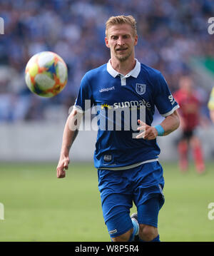 Magdeburg, Germany. 10th Aug, 2019. Soccer: DFB Cup, 1st FC Magdeburg - SC Freiburg, 1st round in the MDCC Arena. Magdeburg's Dominik Ernst is on the ball. Credit: Peter Steffen/dpa - IMPORTANT NOTE: In accordance with the requirements of the DFL Deutsche Fußball Liga or the DFB Deutscher Fußball-Bund, it is prohibited to use or have used photographs taken in the stadium and/or the match in the form of sequence images and/or video-like photo sequences./dpa/Alamy Live News Stock Photo