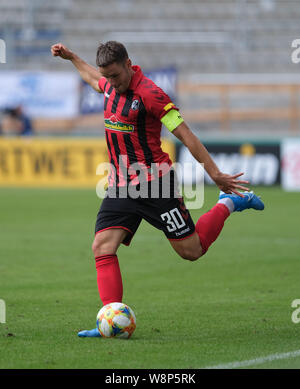 Magdeburg, Germany. 10th Aug, 2019. Soccer: DFB Cup, 1st FC Magdeburg - SC Freiburg, 1st round in the MDCC Arena. Freiburg's Christian Günter is on the ball. Credit: Peter Steffen/dpa - IMPORTANT NOTE: In accordance with the requirements of the DFL Deutsche Fußball Liga or the DFB Deutscher Fußball-Bund, it is prohibited to use or have used photographs taken in the stadium and/or the match in the form of sequence images and/or video-like photo sequences./dpa/Alamy Live News Stock Photo