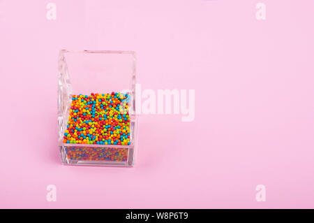 Multicolor candies in glass bowl. Stock Photo