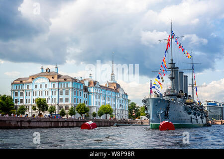 The Russian Cruiser Aurora festooned with flags on the River Neva in St Petersburg, Russia on 23 July 2019 Stock Photo