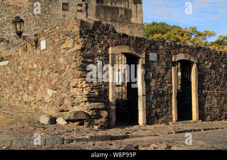 Old ruins, quaint cobblestone streets, and Portuguese and Spanish architecture make up some of the prime features of Colonia del Sacramento in Uruguay Stock Photo