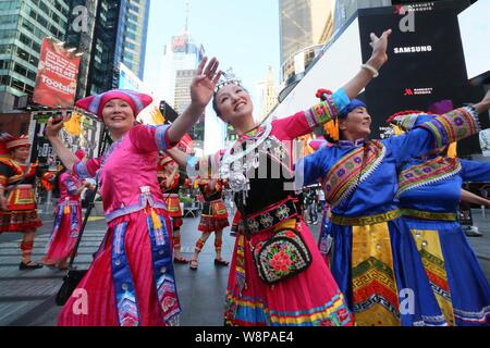 New York, USA. 10th Aug, 2019. People wearing Chinese folk costumes sing Chinese folk song at Times Square of New York, the United States, on Aug. 10, 2019. Credit: Gu Xinnan/Xinhua Credit: Xinhua/Alamy Live News Stock Photo