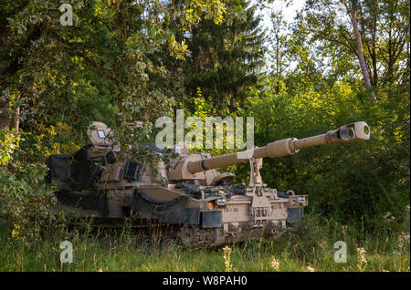 An Army Paladin M109A7 Artillery System Assigned To Alpha Battery, 1st ...