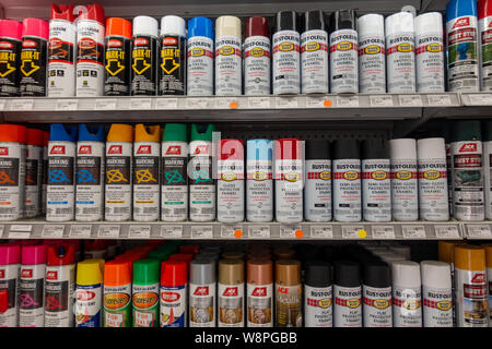 Ft. Pierce,FL/USA-810/19: Spray Paint cans lined up on a shelf at a hardware store. Stock Photo