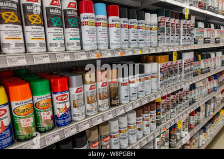 Ft. Pierce,FL/USA-810/19: Spray Paint cans lined up on a shelf at a hardware store. Stock Photo
