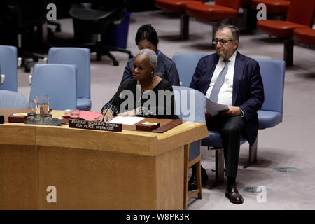 (190810) -- UNITED NATIONS, Aug. 10, 2019 (Xinhua) -- Bintou Keita (front), Assistant Secretary-General for Africa in the UN Department of Political and Peacebuilding Affairs and Department of Peace Operations, briefs a Security Council emergency meeting on the situation in Libya at the UN headquarters in New York, Aug. 10, 2019. United Nations Security Council on Saturday strongly condemned the car bomb attack in Benghazi, Libya, in which three UN staff members were killed and several others injured. (Xinhua/Li Muzi) Stock Photo