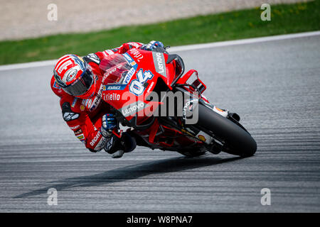 Ducati Team's Italian rider Andrea Dovizioso competes during the qualifying session of the Austrian MotoGP Grand Prix. Stock Photo