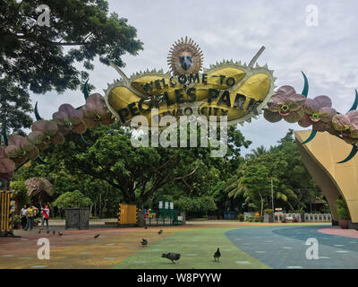 June 15, 2019-Davao Philippines : The welcome arch at the Peoples park in Davao Philippines with pigeons on the ground Stock Photo