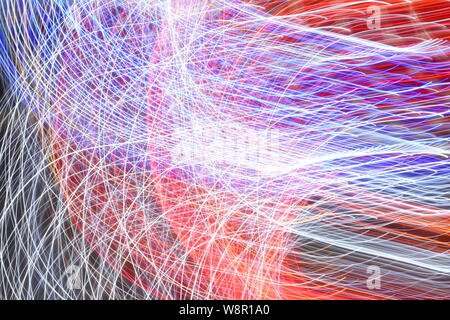 Abstract pattern of blue and red light curved lines forming a network with nodes and loose ends. Connection, energy, light, power concept. Stock Photo