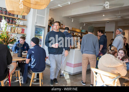 Sydney cafe in Balgowlah, breakfast time and customers ordering coffee and food,Sydney,Australia Stock Photo