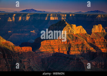 Sunset at Bright Angel Point on the North Rim of the Grand Canyon, Arizona ..... The Grand Canyon is a steep-sided canyon carved by the Colorado River Stock Photo
