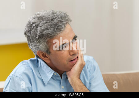 Senior man suffering from toothache Stock Photo