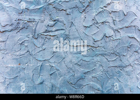 Trowel plaster. Plastered wall blue color, rough surface full background, texture Stock Photo