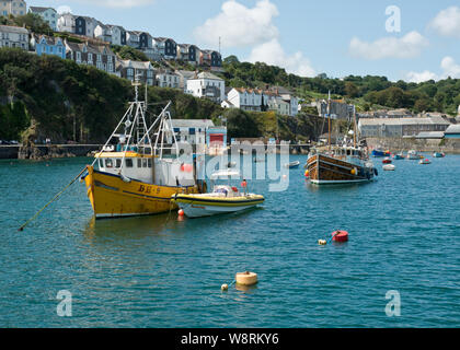 Inshore fishing boats in outer harbour. Mevagissey, Cornwall, England, United Kingdom Stock Photo