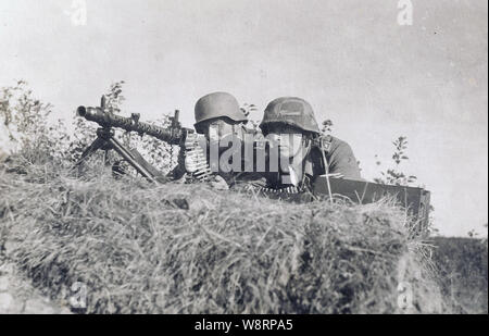 German Soldiers fire a light Machine Gun MG34 on the Russian Front 1942 Stock Photo