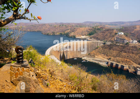 View of the Kariba hydroelectric dam in the Kariba gorge of the Zambezi river between Zimbabwe and Zambia in southern Africa. The dam forms lake Karib Stock Photo