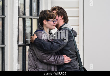 Lovers in a public display of affection Stock Photo - Alamy