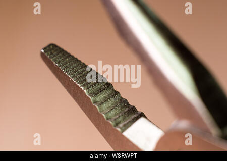 elements small foldable steel multitool, closeup, macro Stock Photo