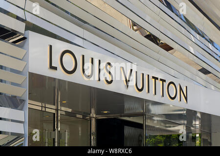 BEVERLY HILLS, CA/USA - MAY 10, 2015: Louis Vuitton retail store exterior on famed Rodeo Drive. Philipp Patrick Plein is a German fashion designer. Stock Photo