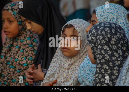 Gaza, Palestine. 11th Aug, 2019. Palestinian Muslims attend a morning prayer celebrating the Eid al-Adha festival in Jabalia in the northen Gaza Strip on August 11, 2019. Muslims are celebrating Eid al-Adha (the feast of sacrifice), the second of two Islamic holidays celebrated worldwide marking the end of the annual pilgrimage or Hajj to the Saudi holy city of Mecca. (Photo by Ramez Habboub/Pacific Press) Credit: Pacific Press Agency/Alamy Live News Stock Photo