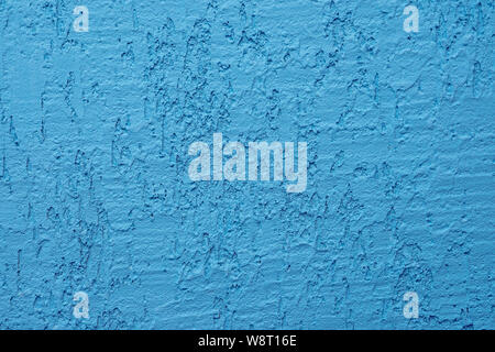 Blue cement wall,Rough surface look like blue sand.Background texture design. Old light blue cement texture and background Stock Photo