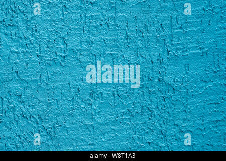 Blue cement wall,Rough surface look like blue sand.Background texture design. Old light blue cement texture and background Stock Photo