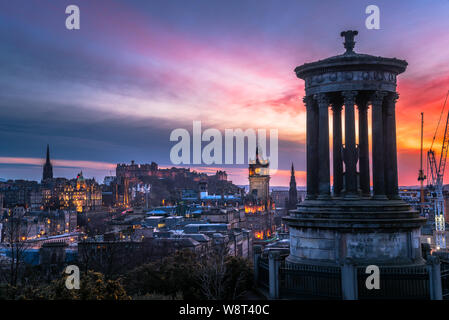 Edinburgh skyline under colourful winter sky at dusk