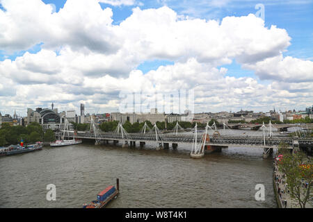 London, Great Britain -May 22, 2016: The Thames, Hungerford Bridge, Westminster Stock Photo