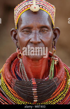 Old Samburu woman with traditional necklace in Ngurunit, Kenya. Stock Photo