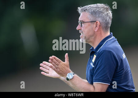 Halberstadt, Germany. 11th Aug, 2019. Soccer: DFB Cup, Germania Halberstadt - 1st FC Union Berlin, 1st round in Friedensstadion. Berlin coach Urs Fischer gestures on the sidelines. Credit: Swen Pförtner/dpa - IMPORTANT NOTE: In accordance with the requirements of the DFL Deutsche Fußball Liga or the DFB Deutscher Fußball-Bund, it is prohibited to use or have used photographs taken in the stadium and/or the match in the form of sequence images and/or video-like photo sequences./dpa/Alamy Live News Stock Photo